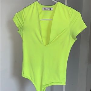 Neon yellow short sleeved bodysuit top